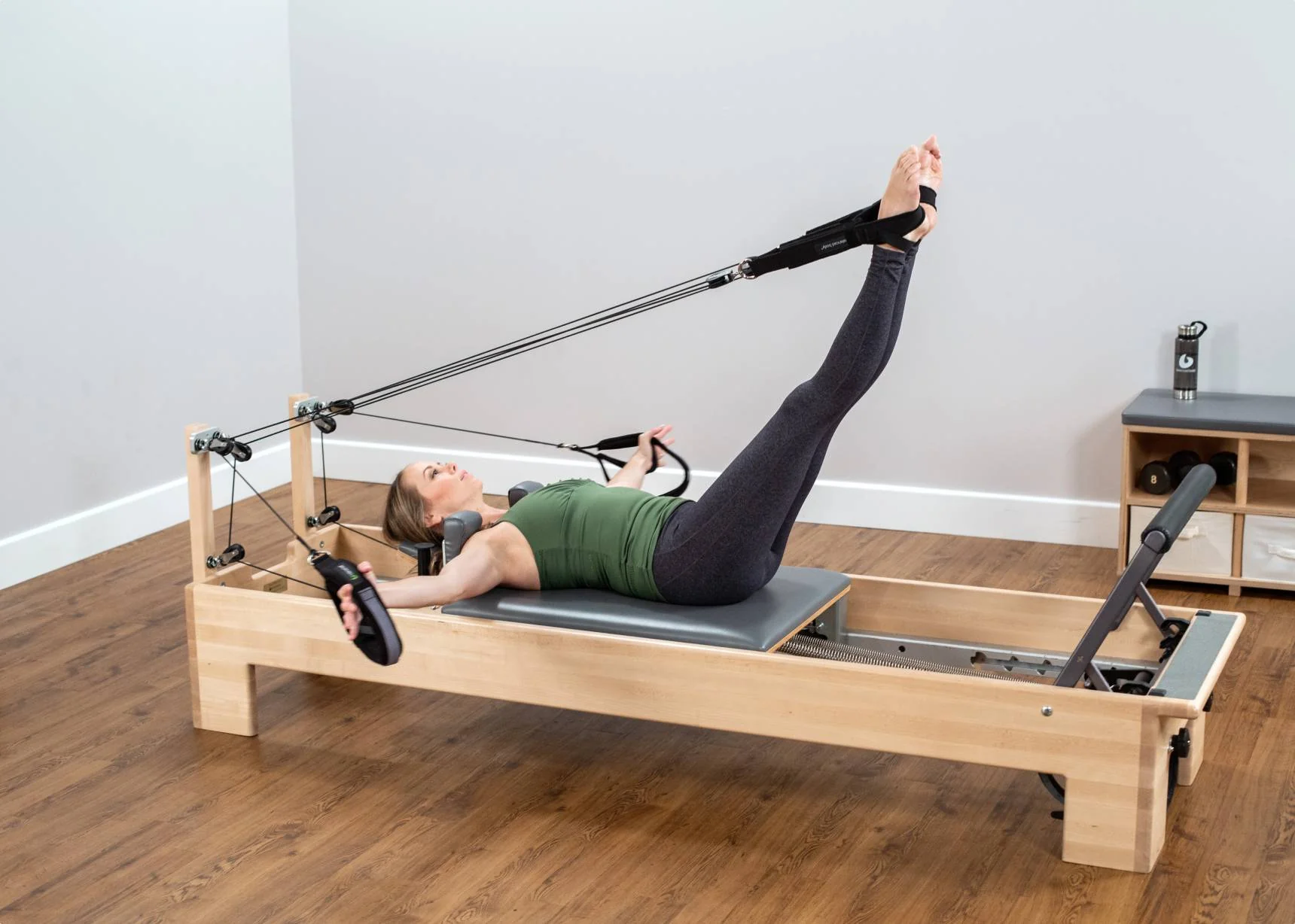 machine pilates reformer femme sport